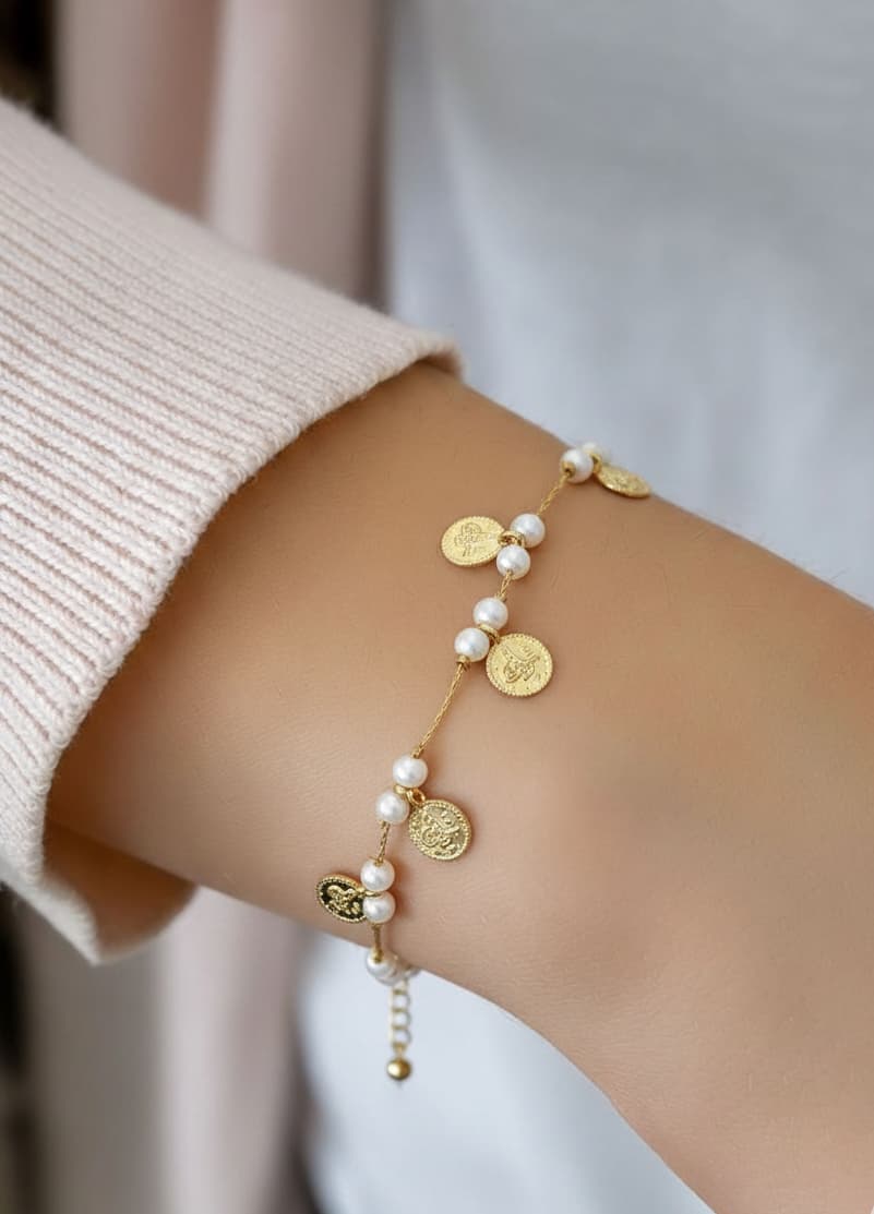 Brass with Gold Plating, Plastic Pearls, and Vintage Coin Dangle Bracelet