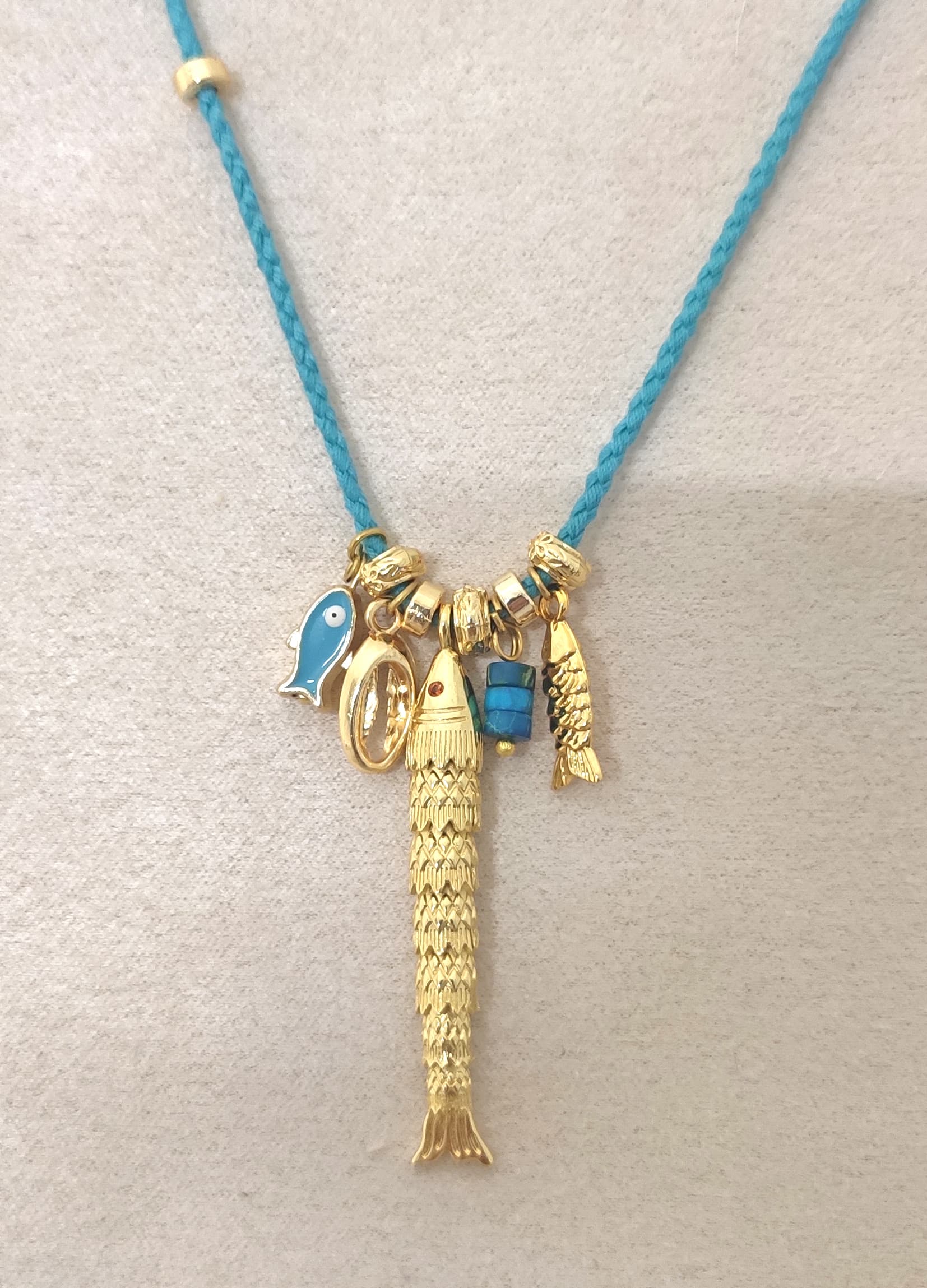 Gold-Plated Fish Pendant Turquoise-Colored Cord Long Necklace