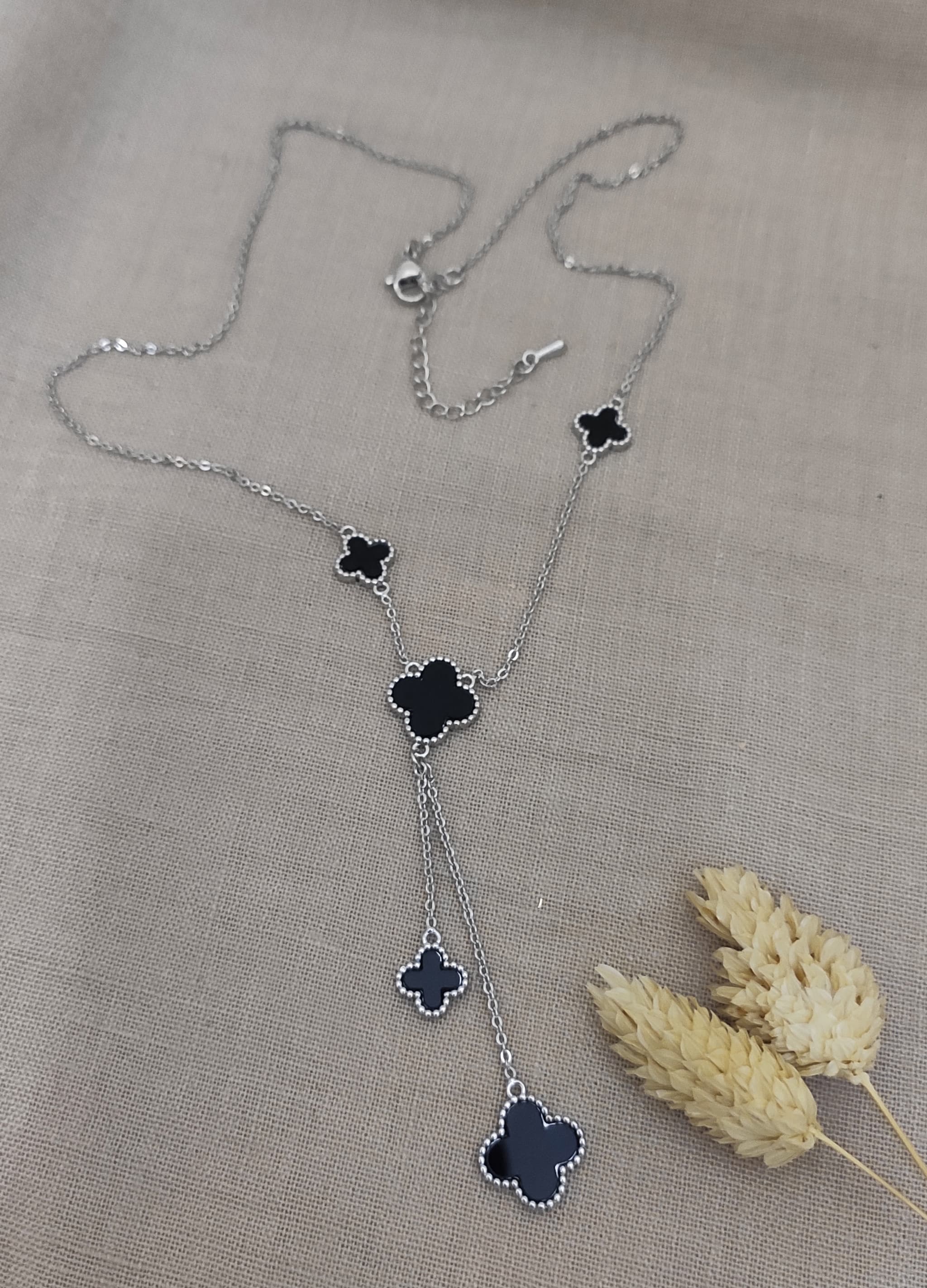 Long Necklace with Silver-Toned Clover Details and Pendants on a Gold-Plated Chain