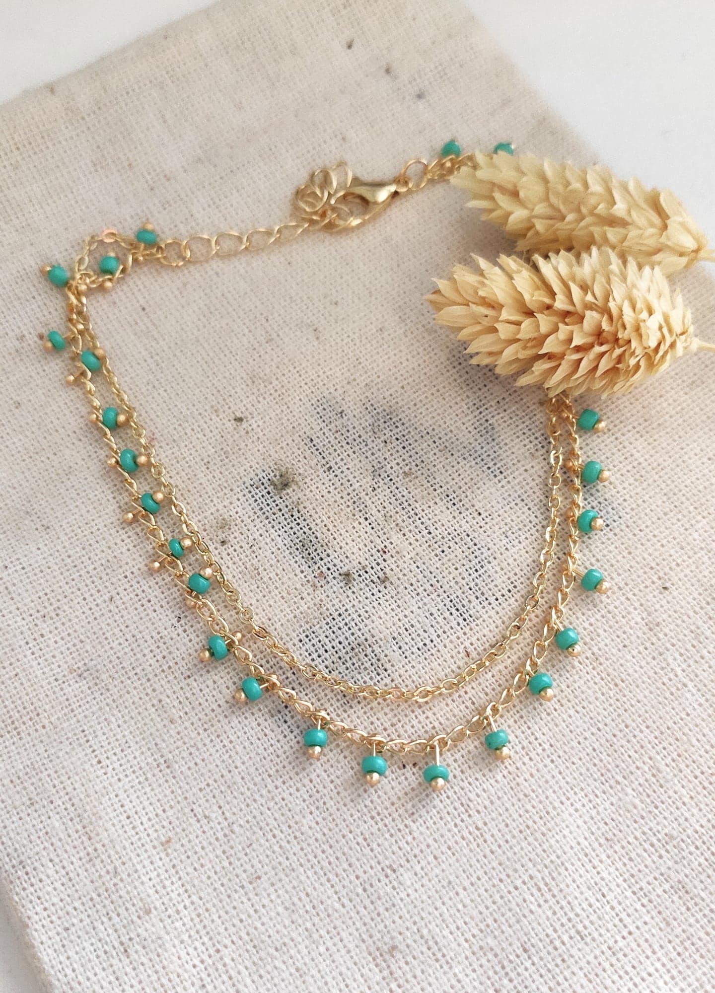 Brass with Gold Plated Turquoise Color Crystal Stone Arranged Double Chain Anklet