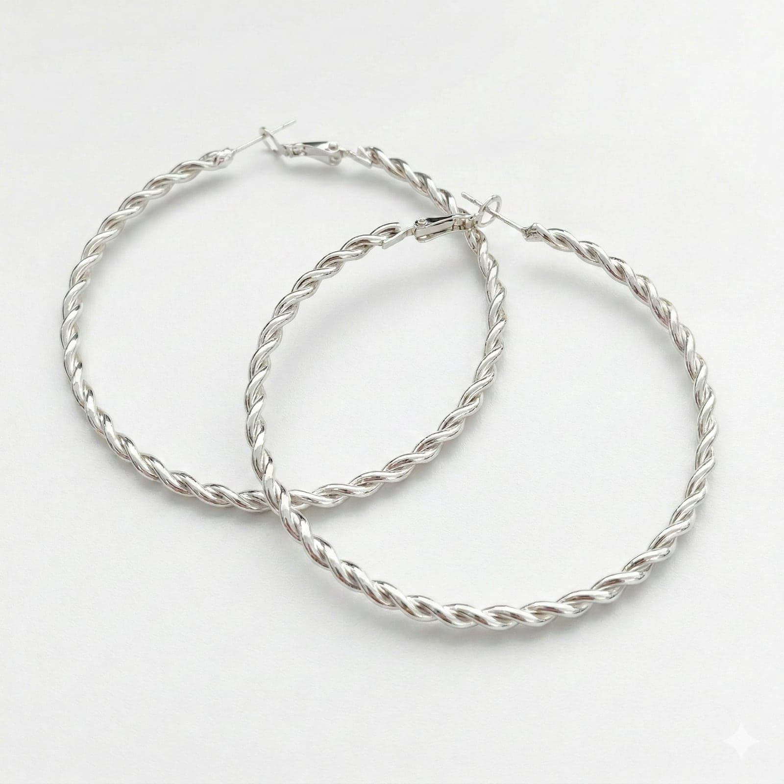 Curved hoop earrings